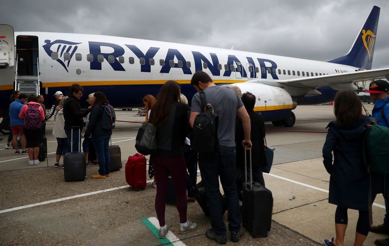 &copy; Reuters. Passengers wait to board a Ryanair flight at Gatwick Airport in London, Britain. Aug 23, 2018. REUTERS/Hannah McKay