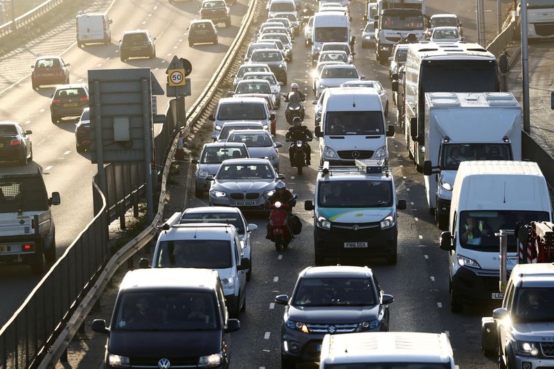 &copy; Reuters. FILE PHOTO: Vehicles sitting in traffic approach the Blackwall Tunnel, as Britain will ban the sale of new petrol and diesel cars and vans from 2030, five years earlier than previously planned, in London, Britain, November 18, 2020. REUTERS/Simon Dawson/F