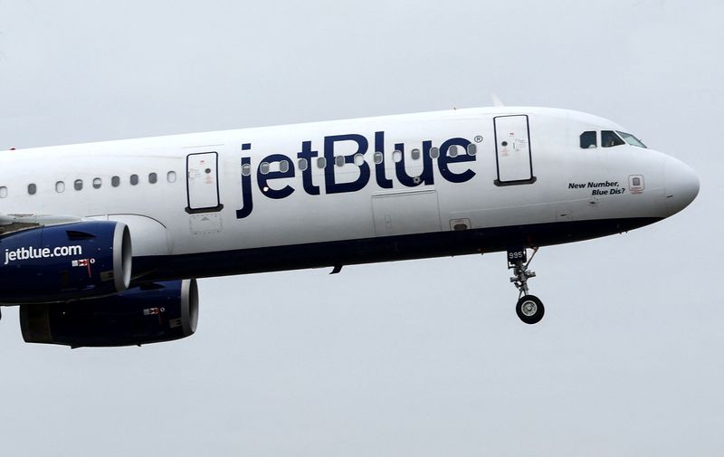 &copy; Reuters. A JetBlue Airways jet comes in for a landing after flights earlier were grounded during an FAA system outage at Laguardia Airport in New York City, New York, U.S., January 11, 2023. REUTERS/Mike Segar