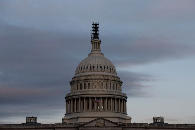 &copy; Reuters. The morning sky brightens over the U.S. Capitol, where lawmakers continue to posture and negotiate spending bills ahead of a looming U.S. government shutdown in Washington, U.S. September 28, 2023.  REUTERS/Jonathan Ernst