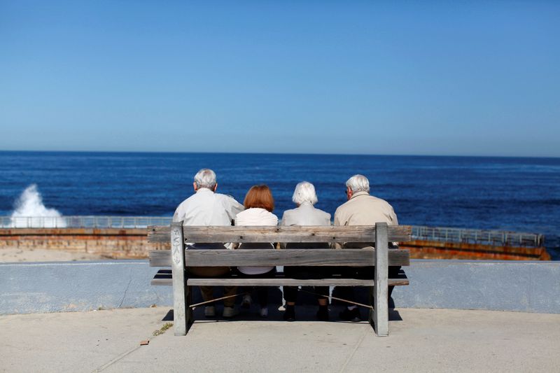 &copy; Reuters. FILE PHOTO: Older couples view the ocean and waves along the beach in La Jolla, California March 8, 2012.  REUTERS/Mike Blake/File Photo