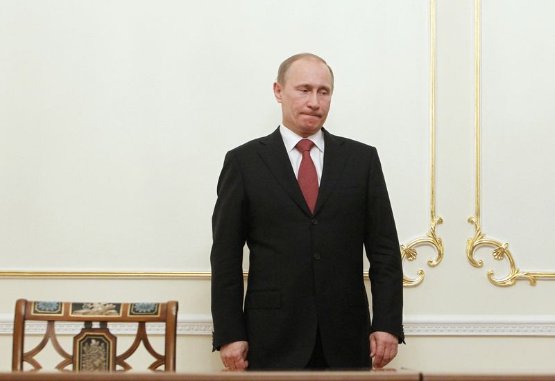 &copy; Reuters. Le président russe Vladimir Poutine, alors Premier ministre, lors d'une cérémonie de signature à la résidence Novo-Ogaryovo, à l'extérieur de Moscou. /Photo prise le 21 mars 2011/REUTERS/Denis Sinyakov