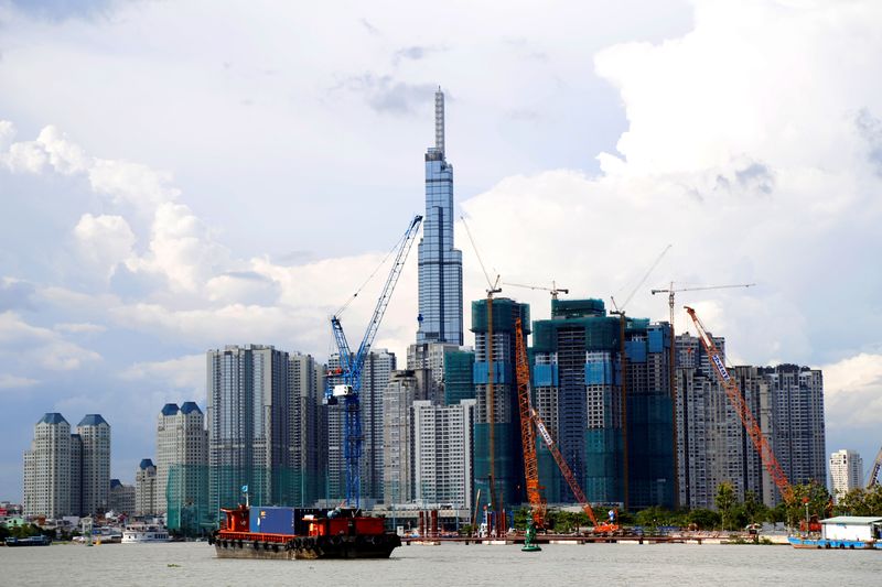 &copy; Reuters. FILE PHOTO: Vinhomes Central Park and Landmark 81, Vietnam's tallest building are seen from the Saigon river in Ho Chi Minh city, Vietnam June 6, 2019. REUTERS/Yen Duong