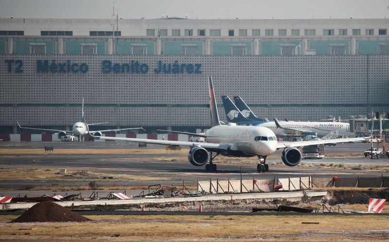 © Reuters. FILE PHOTO: A Delta Air Lines airplane is seen at Benito Juarez international airport in Mexico City, Mexico January 19, 2023. REUTERS/Henry Romero/File Photo