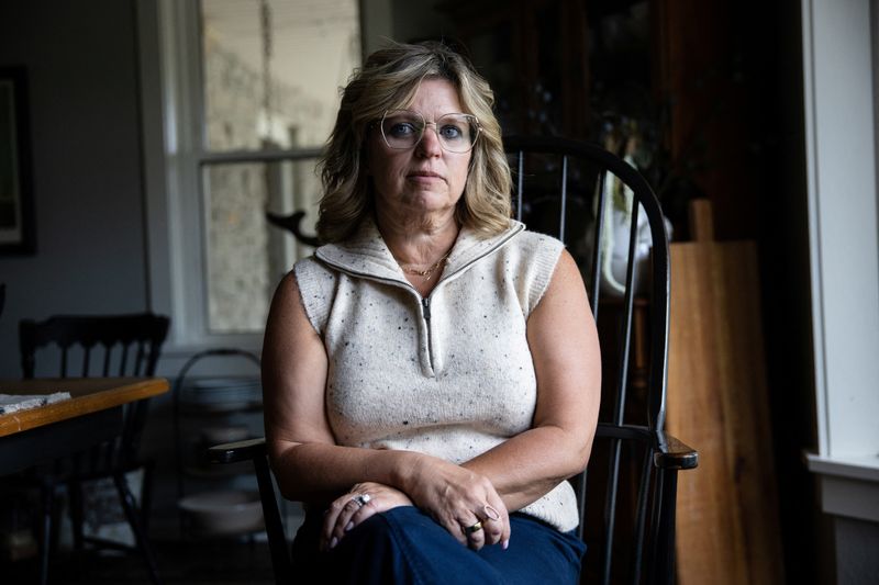 &copy; Reuters. Dawn Heidlebaugh sits in her dining room in her home in Findlay, Ohio, September 19, 2023. REUTERS/Megan Jelinger