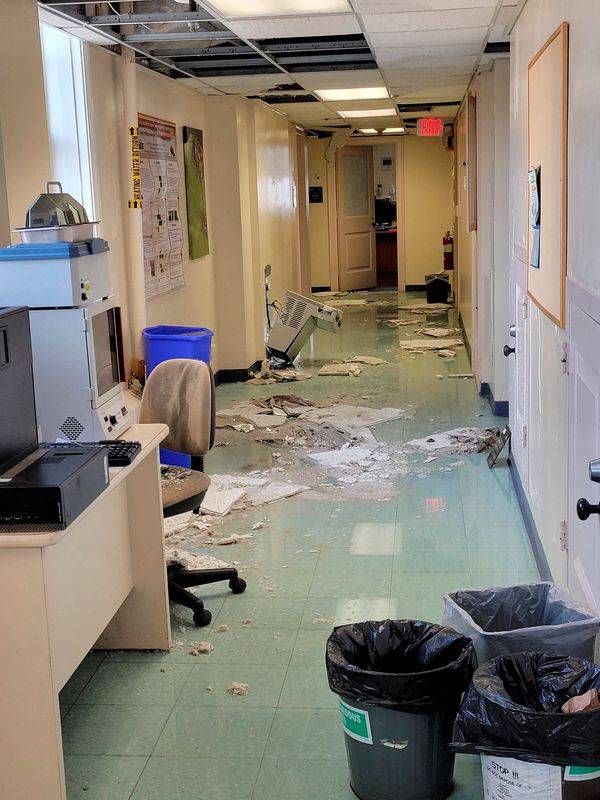 &copy; Reuters. FILE PHOTO: A damaged hallway in the U.S. Department of Agriculture’s (USDA) Beltsville Agricultural Research Center (BARC) is seen in a photo taken by an employee after a 2022 Christmas Day flood and ceiling collapses at the research facility, where em