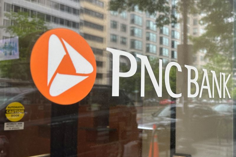 &copy; Reuters. FILE PHOTO:The logo of PNC Bank, a subsidiary of PNC Financial Services Group, is seen on the window of a branch in Washington, U.S. April 30, 2023.  REUTERS/Ashraf Fahim/File Photo