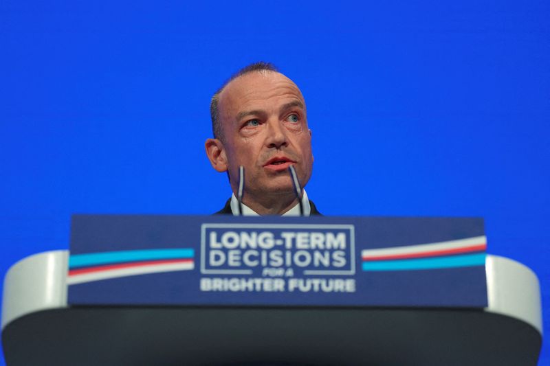 &copy; Reuters. FILE PHOTO: Secretary of State for Northern Ireland Chris Heaton-Harris speaks on stage at the Conservative Party's annual conference in Manchester, Britain, October 1, 2023. REUTERS/Toby Melville/File Photo
