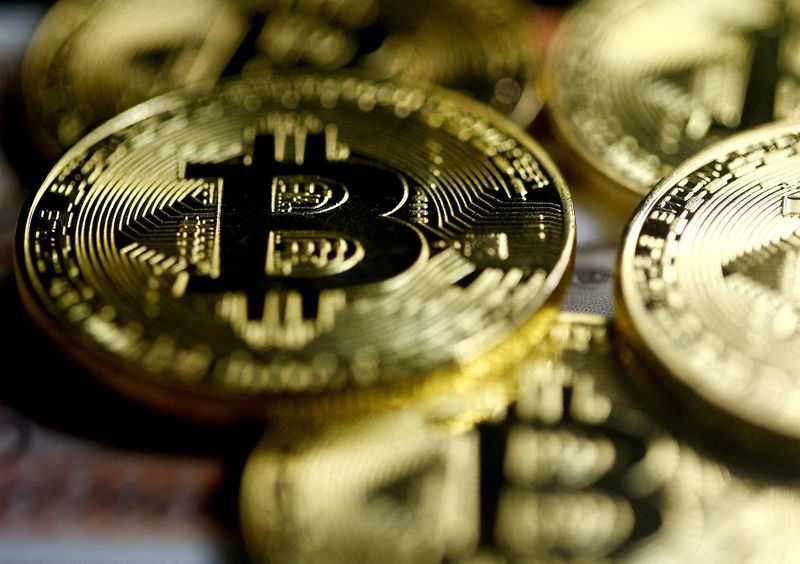 &copy; Reuters. Bitcoins are seen in this illustration picture taken September 27, 2017. REUTERS/Dado Ruvic/Illustration
