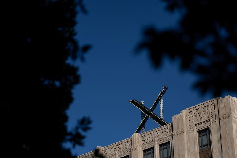 &copy; Reuters. FILE PHOTO: 'X' logo is seen on the top of the headquarters of the messaging platform X, formerly known as Twitter, in downtown San Francisco, California, U.S., July 30, 2023.  REUTERS/Carlos Barria/File Photo