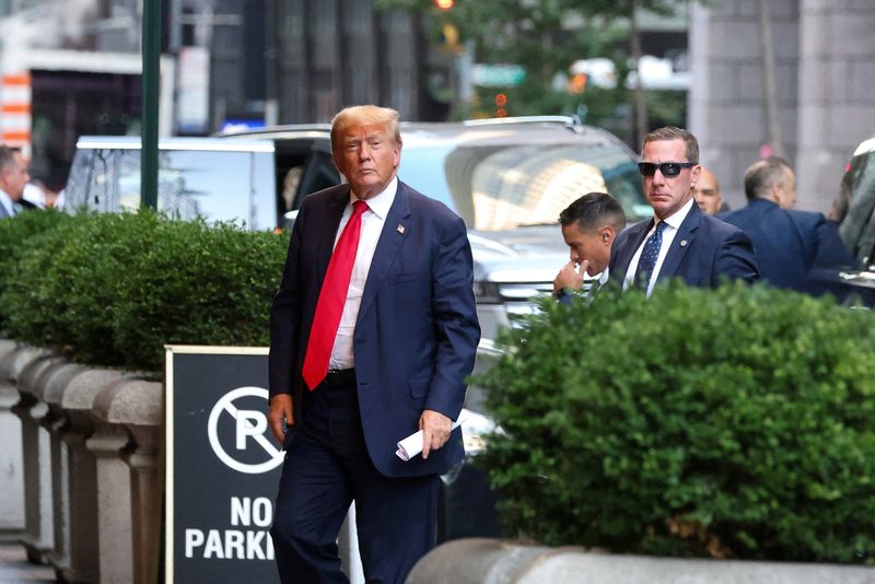 &copy; Reuters. FILE PHOTO: Former U.S. President Donald Trump walks outside as the trial of himself, his adult sons, the Trump Organization and others in a civil fraud case brought by state Attorney General Letitia James continues, in New York City, U.S., October 3, 202