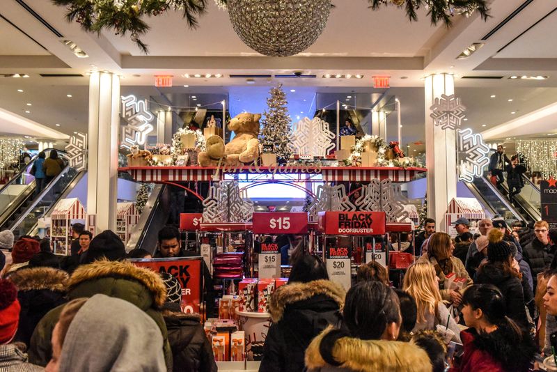 &copy; Reuters. FILE PHOTO: People shop during a Black Friday sales event at Macy's flagship store on 34th St. in New York City, U.S., November 22, 2018. REUTERS/Stephanie Keith/File Photo