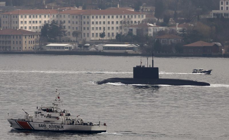 &copy; Reuters. Russia's diesel-electric submarine Rostov-on-Don is escorted by a Turkish Navy Coast Guard boat as it sets sail in the Bosphorus, on its way to the Black Sea, in Istanbul, Turkey, December 13, 2015. REUTERS/Murad Sezer/File photo
