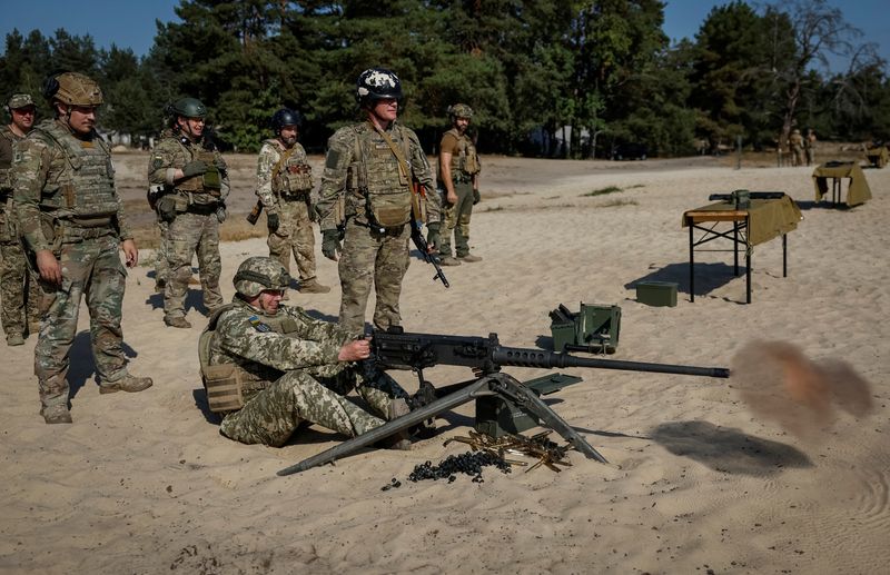 &copy; Reuters. FILE PHOTO: Commander of the Joint Forces of the Armed Forces of Ukraine Serhiy Nayev fires an American Browning M2 machine gun during a military exercise, amid Russia's attack on Ukraine, in Kyiv region, Ukraine September 27, 2023. REUTERS/Gleb Garanich/