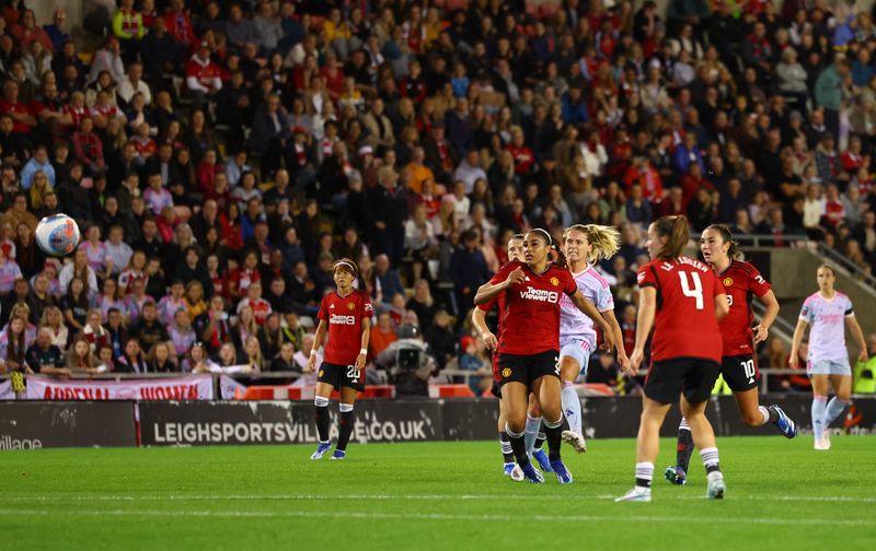 &copy; Reuters. Soccer Football - Women's Super League - Manchester United v Arsenal - Leigh Sports Village, Leigh, Britain - October 6, 2023 Arsenal's Cloe Lacasse scores their second goal REUTERS/Molly Darlington