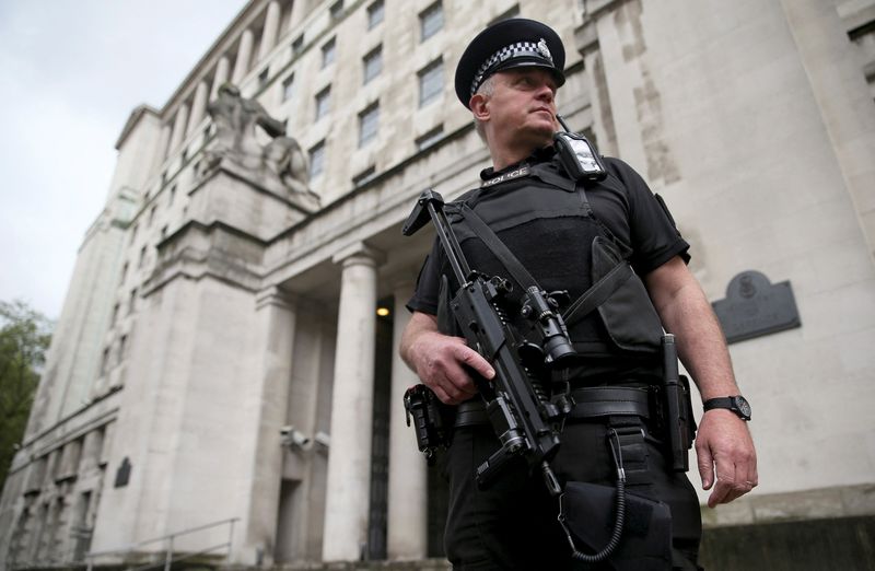 &copy; Reuters. FILE PHOTO: An armed police officer patrols near the Ministry of Defence in London, Britain May 11, 2016. REUTERS/Neil Hall/File Photo