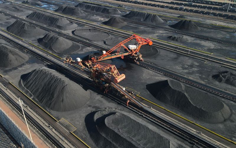 &copy; Reuters. FILE PHOTO: An aerial view of the machinery at the coal terminal of Huanghua port, in Hebei province, China February 1, 2023. China Daily via REUTERS/ File Photo