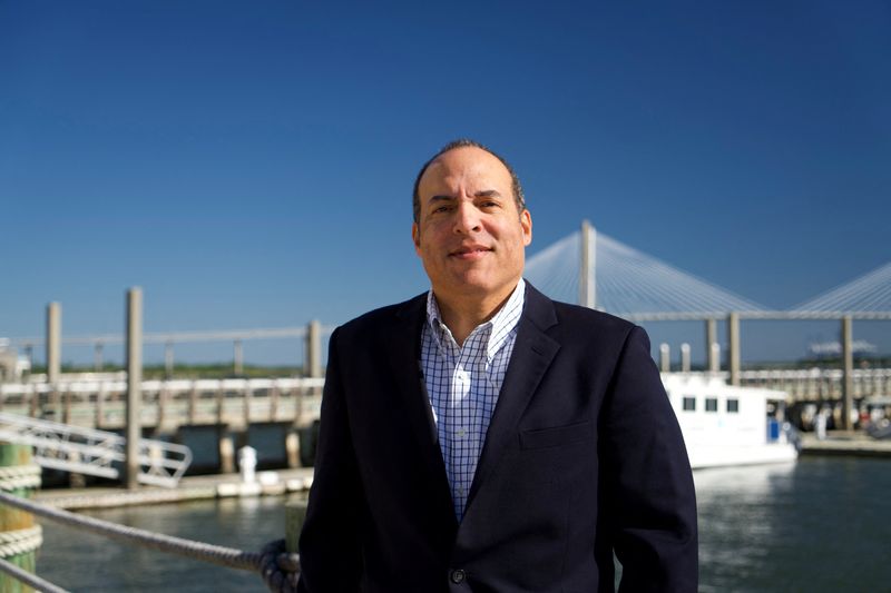 &copy; Reuters. South Carolina Democrat Michael B. Moore poses on the grounds of the International African American Museum where he served as founding president and CEO in Charleston, South Carolina in an undated photograph. Moore is vying to unseat Republican incumbent 