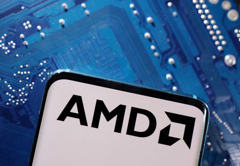 &copy; Reuters. FILE PHOTO: A smartphone with a displayed AMD logo is placed on a computer motherboard in this illustration taken March 6, 2023. REUTERS/Dado Ruvic/Illustration/File Photo