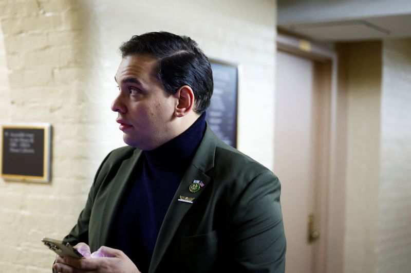 &copy; Reuters. U.S. Representative George Santos (R-NY) walks to a House Republican Conference meeting as Republicans work towards electing a new Speaker of the House on Capitol Hill in Washington, U.S., October 9, 2023. REUTERS/Evelyn Hockstein