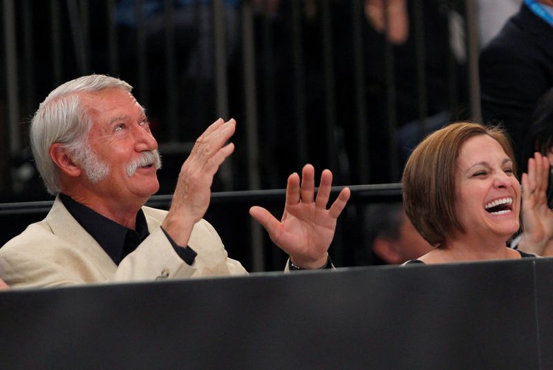 &copy; Reuters. FILE PHOTO: Former Olympic Gold medallist gymnast Mary Lou Retton (R) of the U.S. and her former coach Bela Karolyi laugh as they sit next to the floor during the AT&T American Cup gymnastics competition at New York's Madison Square Garden March 3, 2012. 