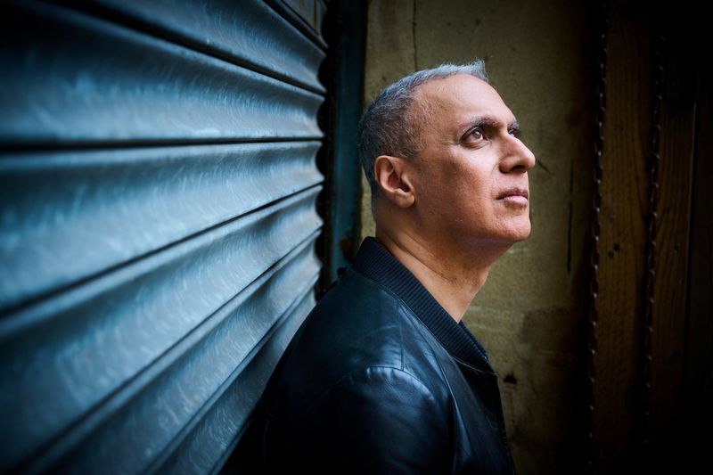 © Reuters. Musician, producer and composer Nitin Sawhney poses for a photo in this undated handout picture obtained by Reuters on October 11, 2023. Warner Music/Ray Burmiston/Handout via REUTERS