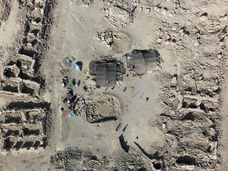 © Reuters. A drone view of destroyed houses after the recent earthquake in Chahak village in the Enjil district of Herat province, Afghanistan, October 11, 2023. REUTERS/Stringer