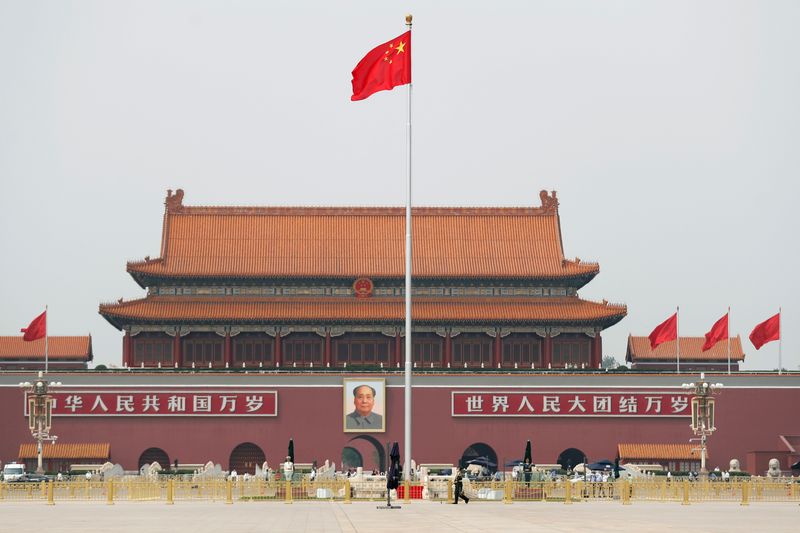 &copy; Reuters. The Chinese flag flutters on Tiananmen Square before the opening session of the Chinese People's Political Consultative Conference (CPPCC) in Beijing, China May 21, 2020. REUTERS/Carlos Garcia Rawlins/File Photo