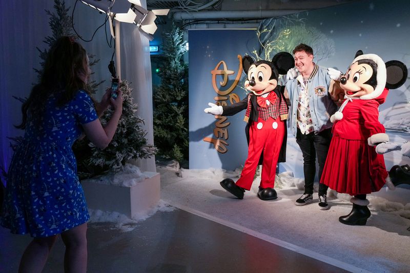 &copy; Reuters. People take photos at Disney's product showcase during Magical Christmas Market in London, Britain November 2, 2022. REUTERS/Maja Smiejkowska/File Photo