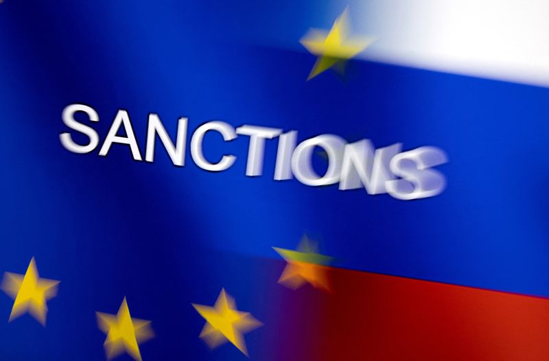 &copy; Reuters. FILE PHOTO: Word "Sanctions" is displayed on EU and Russian flags in this illustration taken, February 27, 2022. REUTERS/Dado Ruvic/Illustration/File Photo