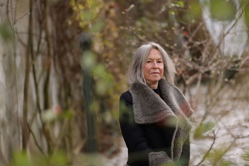 &copy; Reuters. FILE PHOTO: American poet Louise Gluck, winner of the 2020 Nobel Prize for Literature, poses outside her home in Cambridge, Massachusetts, U.S., in this undated handout image obtained by Reuters on December 7, 2020. © Nobel Prize Outreach/Daniel Ebersole