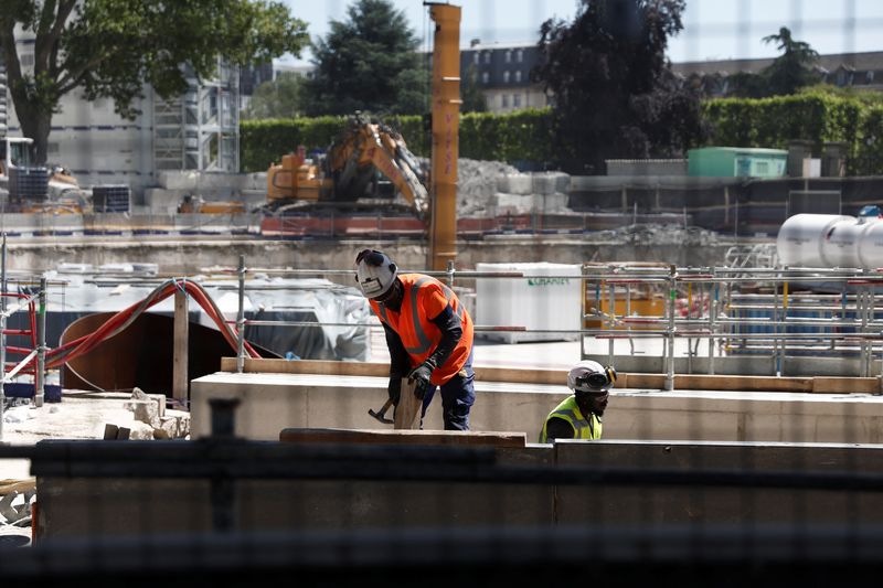 &copy; Reuters. FILE PHOTO: Workers are seen at the construction site of the Austerlitz basin, a water storage reservoir for wastewater and rainwater, build to improve the sanitary quality of the water in the Seine River, in Paris, France, May 25, 2023. REUTERS/Benoit Te