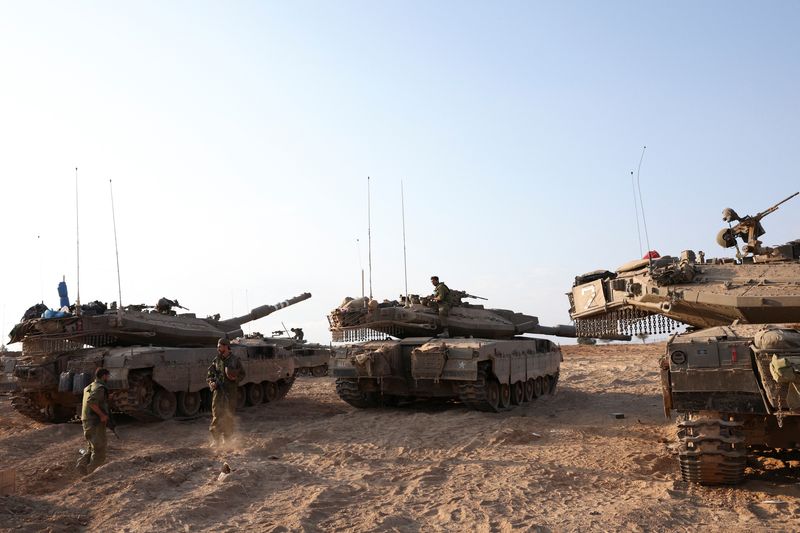 &copy; Reuters. Israeli tanks are seen in the aftermath of a mass infiltration by Hamas gunmen from the Gaza Strip, in Kibbutz Beeri in southern Israel, October 14, 2023. REUTERS/Violeta Santos Moura