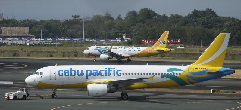 &copy; Reuters. FILE PHOTO: Cebu Pacific passenger jets are pictured at the tarmac of Terminal 3 at the Ninoy Aquino International aiport in Pasay city, Metro Manila Philippines April 1, 2016. REUTERS/Erik De Castro/File Photo