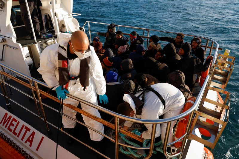 &copy; Reuters. Migrants rescued by a merchant vessel wait to disembark from a Malta Armed Forces patrol boat outside Marsaxlokk, Malta April 17, 2023. REUTERS/Darrin Zammit Lupi