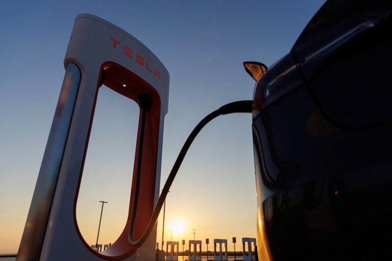 &copy; Reuters. A Tesla vehicle is charged at a Tesla supercharging station in Kettleman City, California, U.S., January 25, 2023.  REUTERS/Mike Blake/File photo