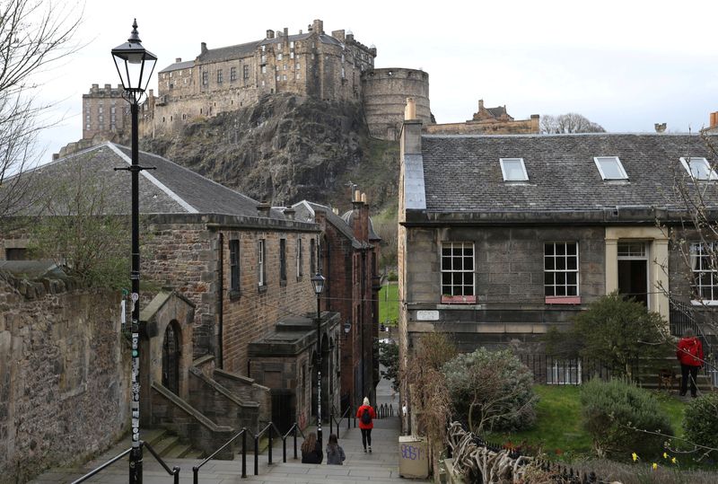 &copy; Reuters. FILE PHOTO: A view of Edinburgh Castle perched on an extinct volcano, Edinburgh, Scotland, Britain, March 30, 2021. Picture taken March 30, 2021. REUTERS/Russell Cheyne/File Photo
