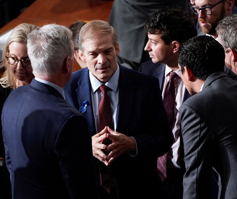 &copy; Reuters. U.S. Rep. Jim Jordan (R-OH) confers with fellow Republicans including former House Speaker Kevin McCarthy (R-CA) after a second round of voting for a new Speaker of the House ended with Jordan once again failing to win the Speaker's gavel on the floor of 