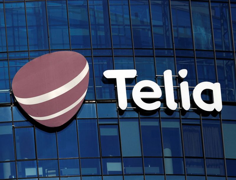© Reuters. FILE PHOTO: Telia sign is seen on a building in Vilnius, Lithuania March 30, 2019. REUTERS/Ints Kalnins/File Photo