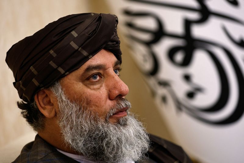 &copy; Reuters. Taliban's acting commerce minister Haji Nooruddin Azizi speaks during an interview with Reuters, at the Embassy of Afghanistan in Beijing, China October 19, 2023. REUTERS/Tingshu Wang
