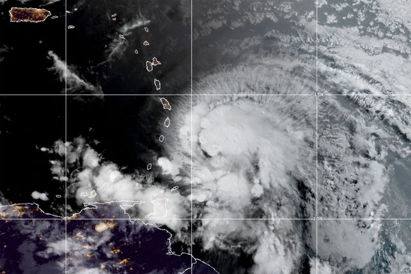 &copy; Reuters. FILE PHOTO: FILE PHOTO: A satellite image shows Hurricane Elsa over the Lesser Antilles and approaching the Caribbean Sea July 2, 2021.  NOAA/Handout via REUTERS /File Photo