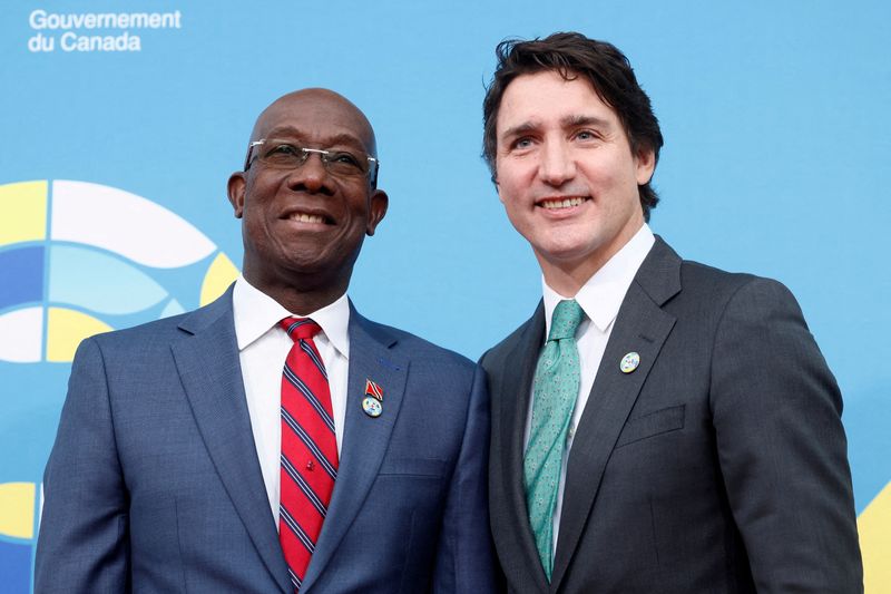 &copy; Reuters. FILE PHOTO: Canada's Prime Minister Justin Trudeau greets Trinidad and Tobago's Prime Minister Keith Rowley at the Canada-CARICOM Summit in Ottawa, Ontario, Canada October 18, 2023. REUTERS/Blair Gable/File Photo