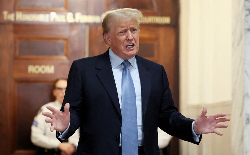 &copy; Reuters. FILE PHOTO: Former U.S. President Donald Trump delivers remarks after exiting the courtroom as he attends his Manhattan courthouse trial in a civil fraud case in New York, U.S., October 18, 2023. REUTERS/Brendan McDermid/File Photo