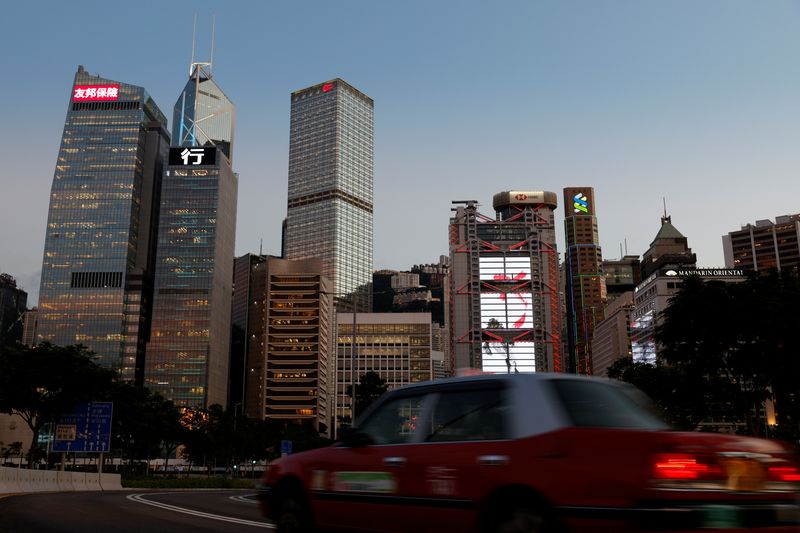 &copy; Reuters. 中国金融規制当局は２０日、国内銀行の不良債権比率が９月第３・四半期末時点で１．６５％だったと発表した。香港のビジネス街で２０２１年撮影。（2023年　ロイター/Tyrone Siu/File photo）