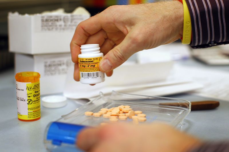 &copy; Reuters. FILE PHOTO: Pharmacist Jim Pearce fills a Suboxone prescription at Boston Healthcare for the Homeless Program in Boston, Massachusetts January 14, 2013. REUTERS/Brian Snyder/File photo