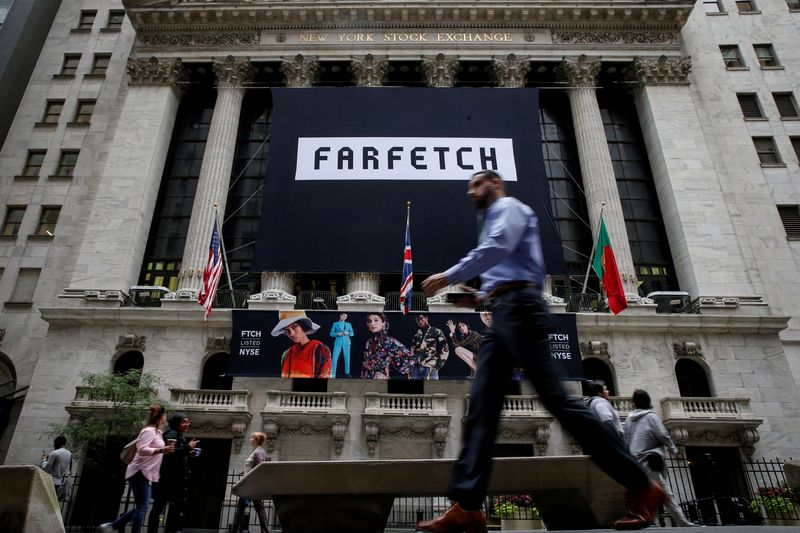 &copy; Reuters. FILE PHOTO: A banner to celebrate the IPO of online fashion house Farfetch is displayed on the facade of the of the New York Stock Exchange (NYSE) in New York, U.S., September 21, 2018. REUTERS/Brendan McDermid/File Photo