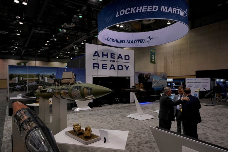 &copy; Reuters. FILE PHOTO: People converse in Lockheed Martin's booth during the Association of the United States Army (AUSA) Global Force Symposium & Exposition in Huntsville, Alabama, U.S. March 28, 2023.  REUTERS/Cheney Orr/File Photo