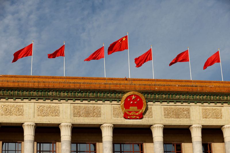 &copy; Reuters. FILE PHOTO: A Chinese flag flutters on top of the Great Hall of the People ahead of the opening ceremony of the Belt and Road Forum (BRF), to mark 10th anniversary of the Belt and Road Initiative, in Beijing, China October 18, 2023. REUTERS/Edgar Su/File 