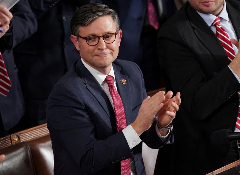 &copy; Reuters. U.S. Rep. Mike Johnson (R-LA), the latest House Republican nominee for House Speaker, reacts to former Speaker nominee and current House Majority Leader Steve Scalise (R-LA) voting for Johnson during another round of voting to pick a new Speaker of the U.