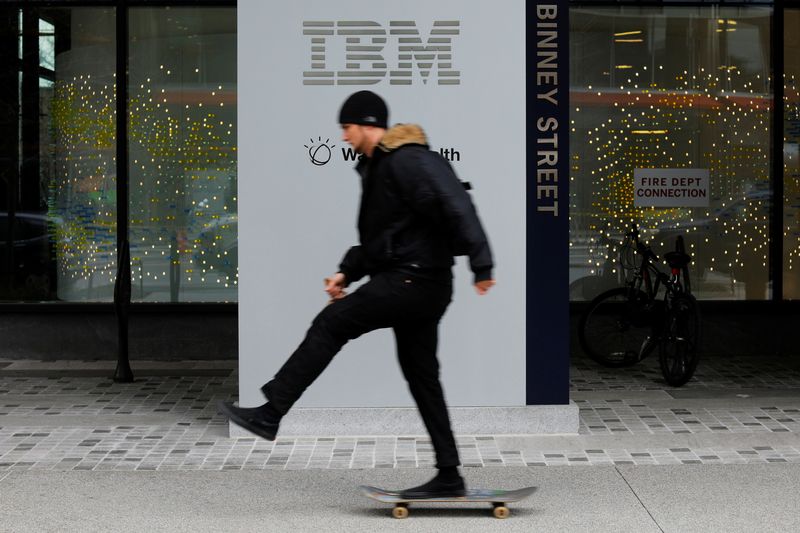 &copy; Reuters. A skateboarder passes the sign for an IBM office in Cambridge, Massachusetts, U.S., January 16, 2018.   REUTERS/Brian Snyder/File photo